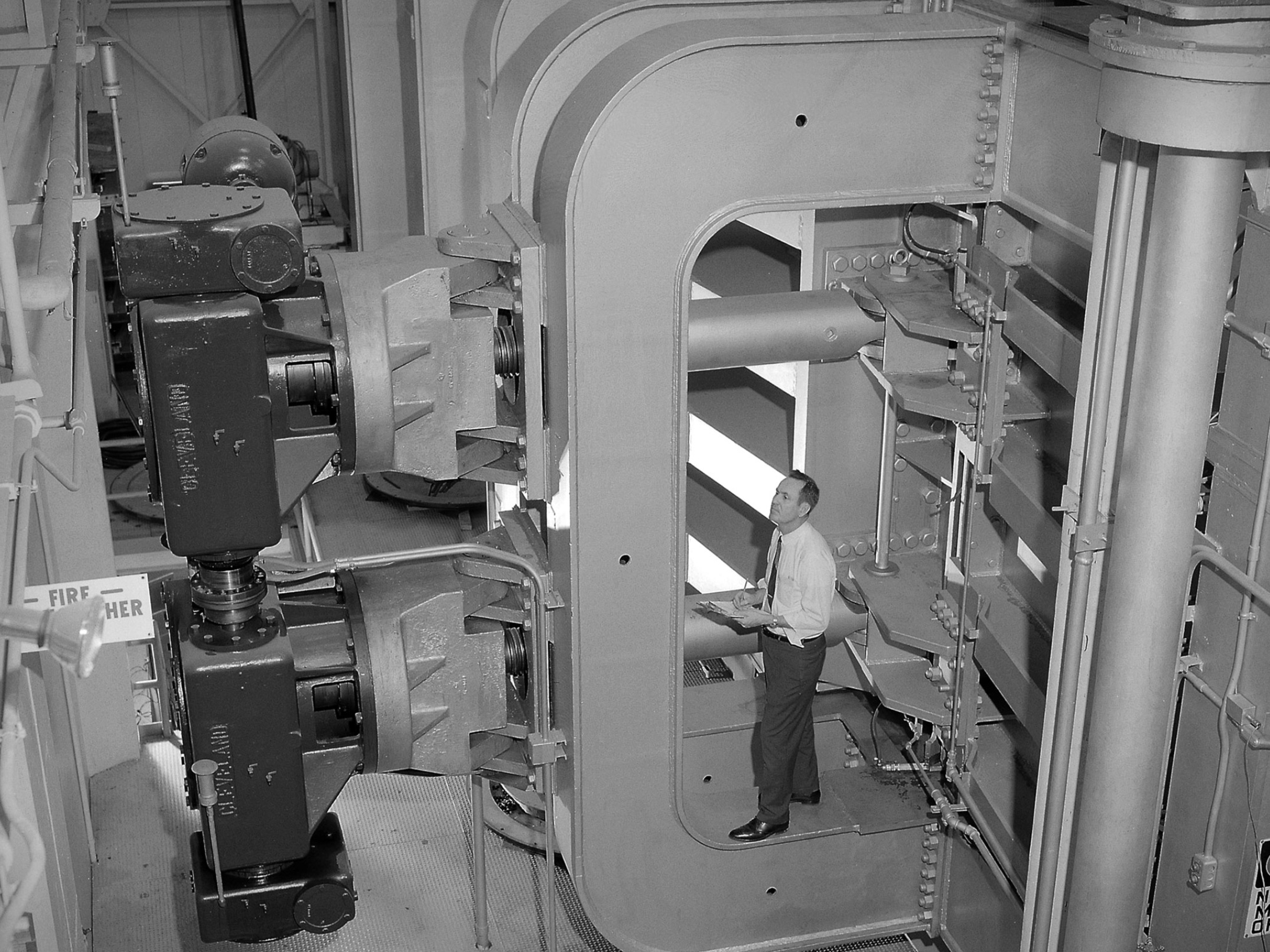 Screwjacks located on the exterior of the second throat section in the 10- by 10-Foot Supersonic Wind Tunnel 